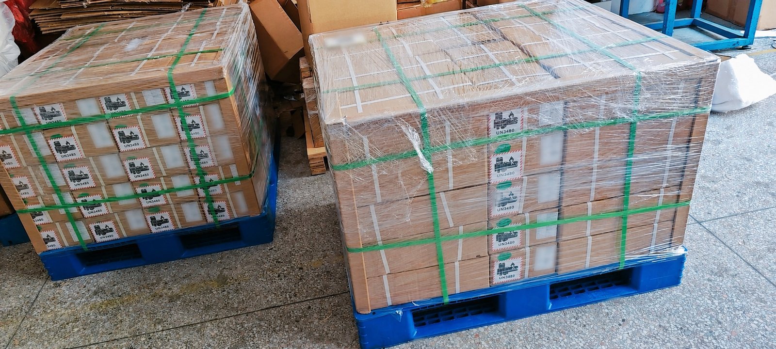Privacy-redacted palletized UN3480 lithium-ion cell shipment