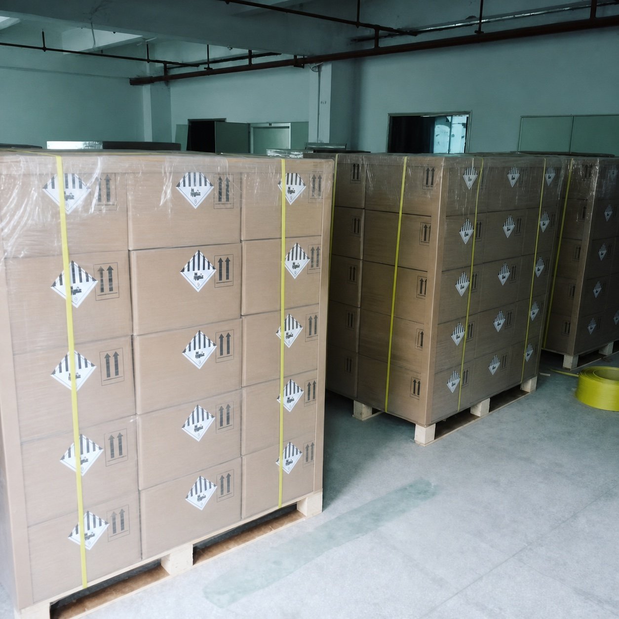 Anonymized pallets of lithium-ion cells prepared for an air-freight customs clearance case