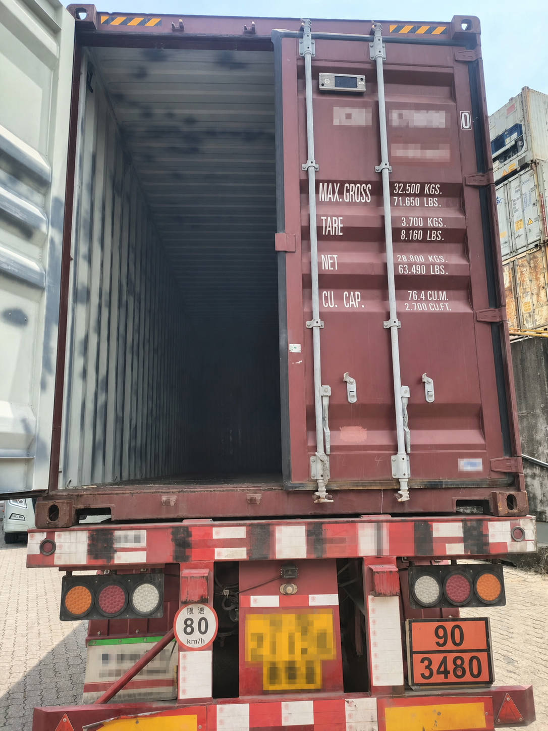 Privacy-edited 40HQ return equipment with 90 / 3480 placard