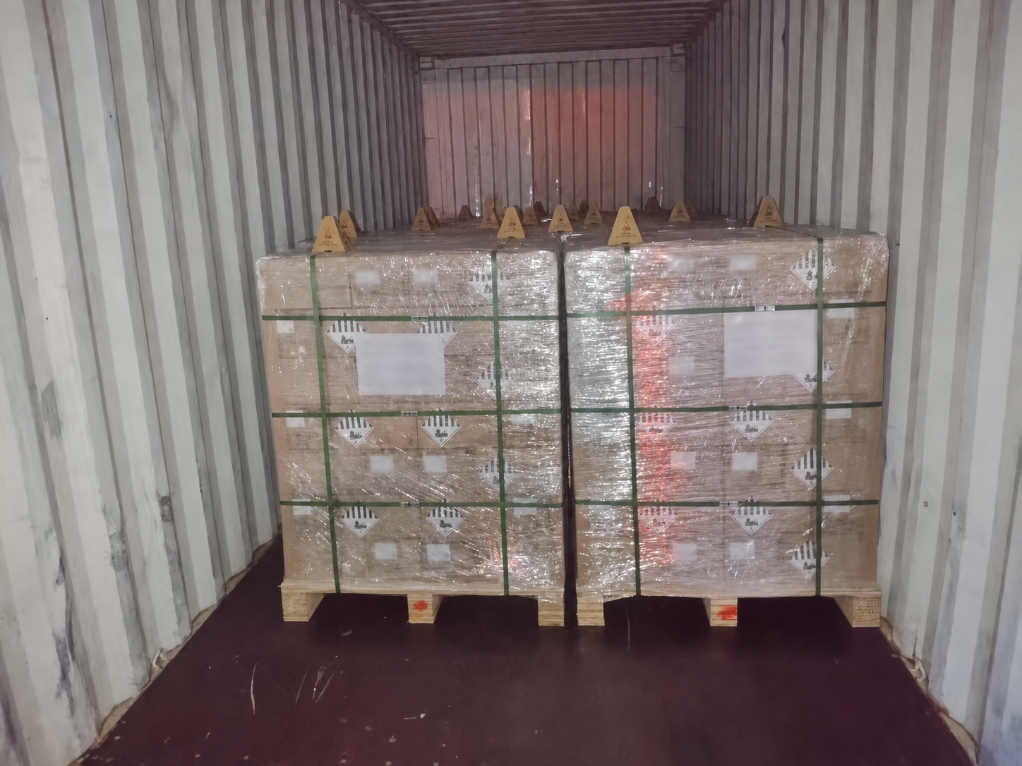 Privacy-edited palletised lithium-ion battery cargo inside a 40HQ container
