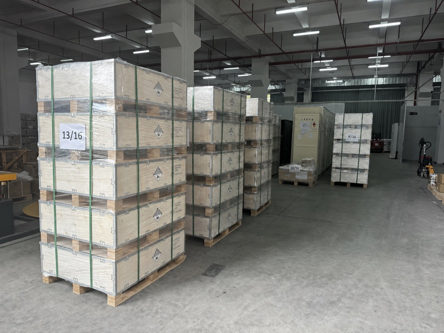 Palletized UN3480 lithium-ion battery shipping crates stored in a warehouse